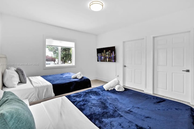 bedroom featuring hardwood / wood-style flooring