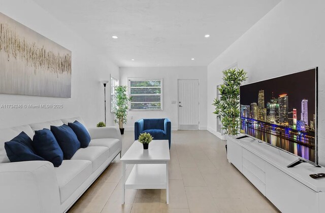 living room featuring light tile patterned floors