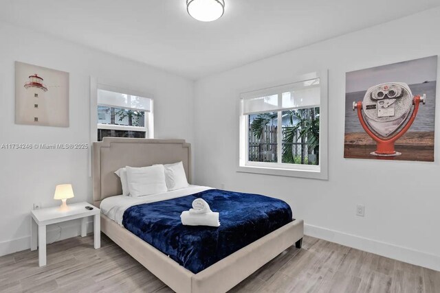 bedroom featuring hardwood / wood-style flooring