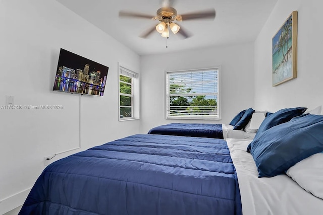 bedroom featuring ceiling fan