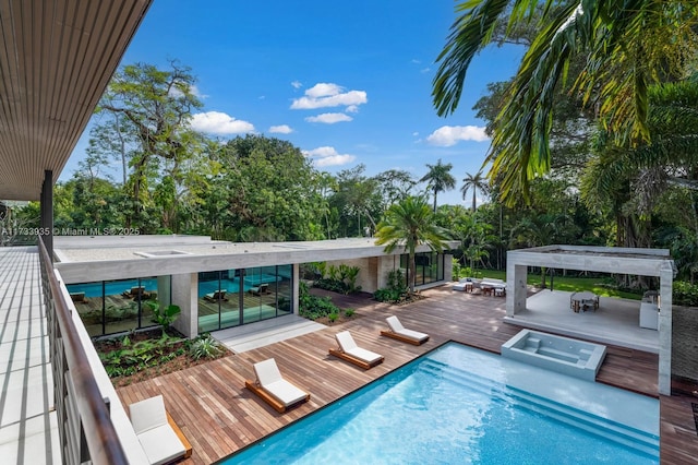 view of pool featuring a wooden deck