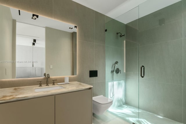 4040 Kiaora St, Miami, FL 33133 - bathroom featuring tile walls, a shower stall, and vanity
