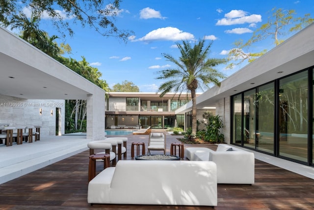 4040 Kiaora St, Miami, FL 33133 - wooden deck featuring an outdoor hangout area and an outdoor pool