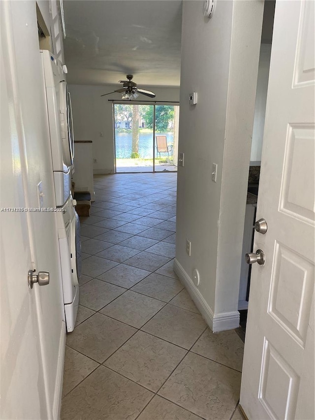 hallway featuring light tile patterned floors