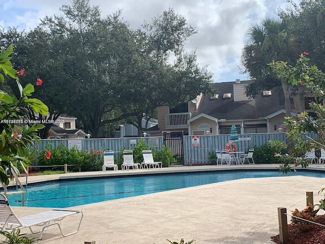 view of pool featuring a patio