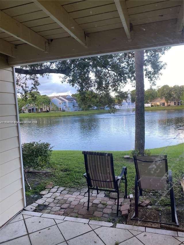 view of patio / terrace featuring a water view