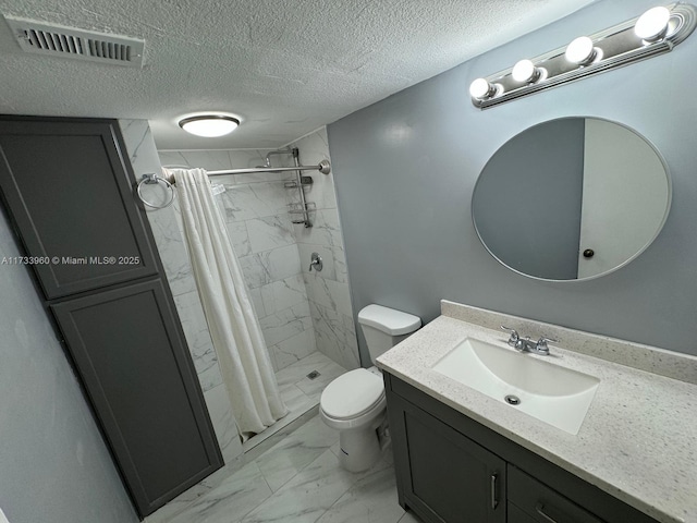 bathroom featuring vanity, a shower with curtain, a textured ceiling, and toilet