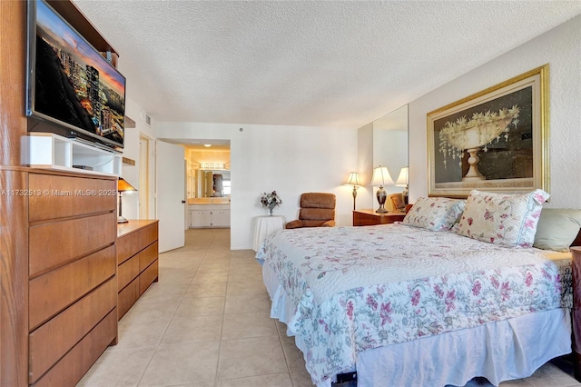 tiled bedroom with a textured ceiling