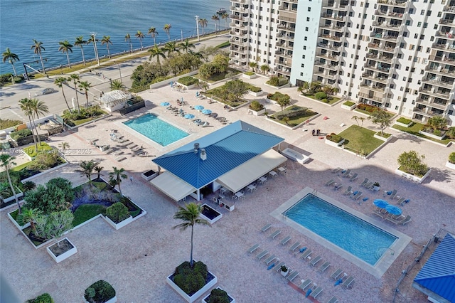 birds eye view of property featuring a water view