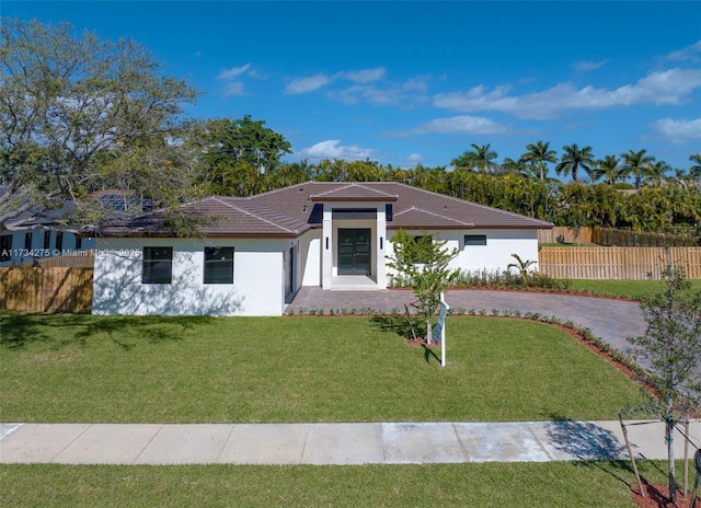 view of front of home with a front yard