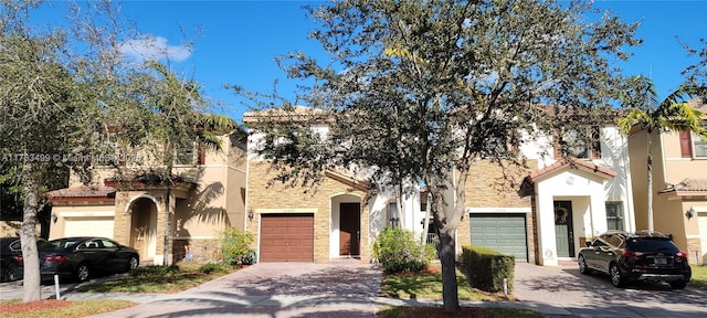 mediterranean / spanish-style home featuring a garage