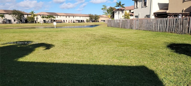 view of yard with a water view