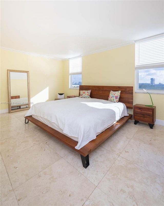 bedroom with crown molding