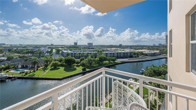 balcony featuring a water view