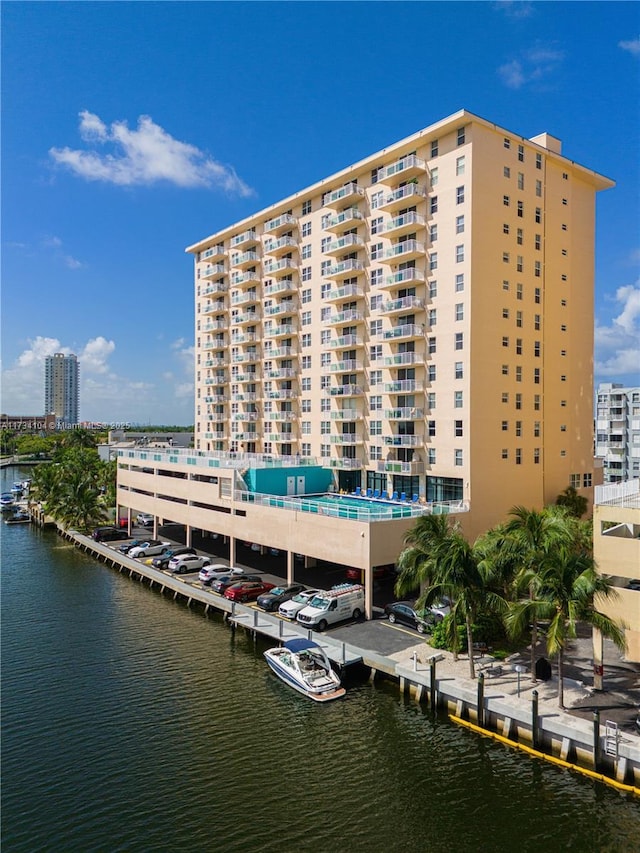 view of building exterior with a water view