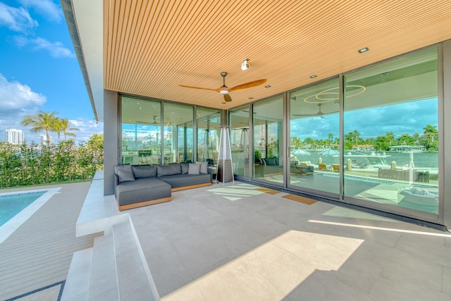 view of patio / terrace with an outdoor hangout area and ceiling fan