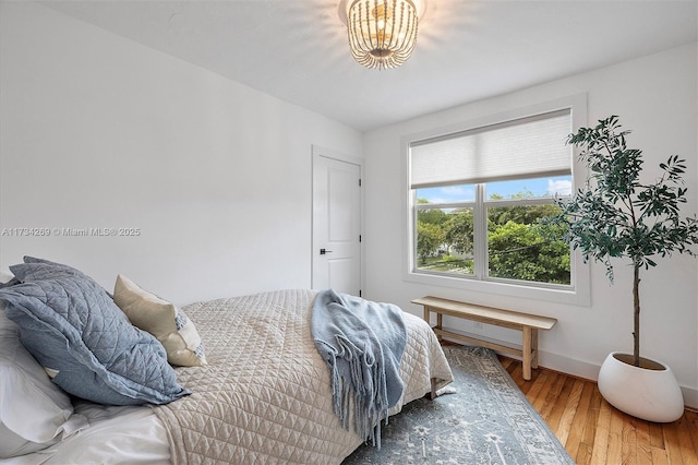 bedroom featuring hardwood / wood-style flooring