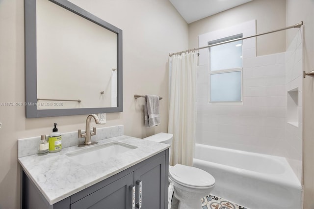 full bathroom with vanity, toilet, and shower / tub combo