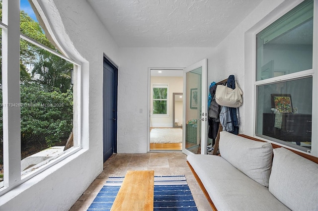 interior space with a textured ceiling