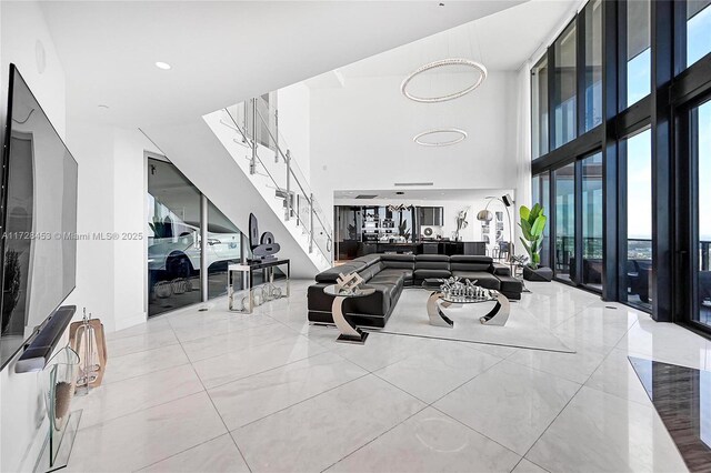 living room with a high ceiling