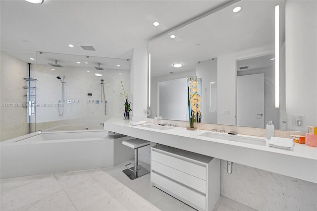 bathroom featuring separate shower and tub and vanity