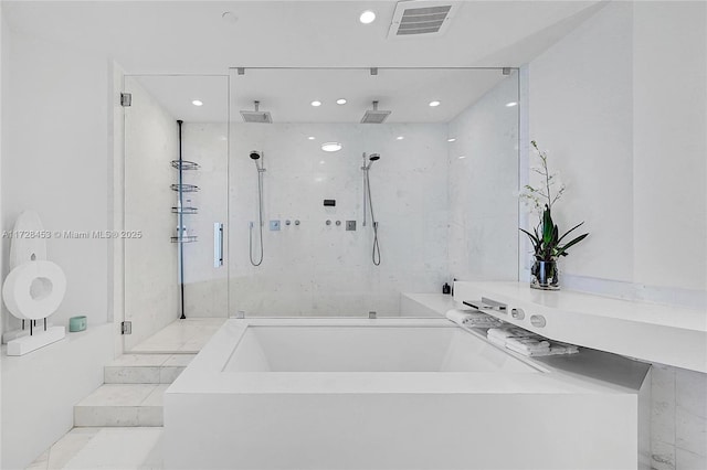 bathroom with independent shower and bath