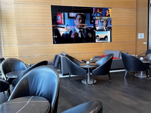 cinema room with hardwood / wood-style floors