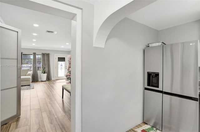 hallway featuring light hardwood / wood-style flooring