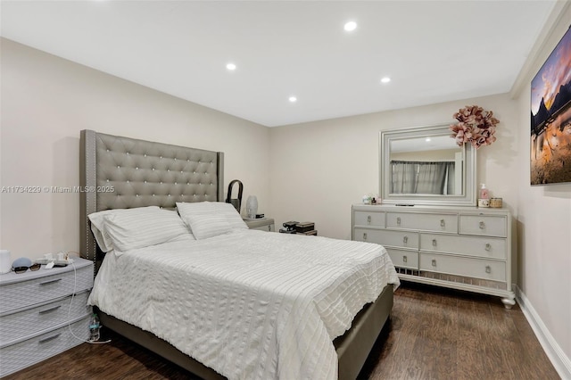 bedroom featuring dark wood-type flooring