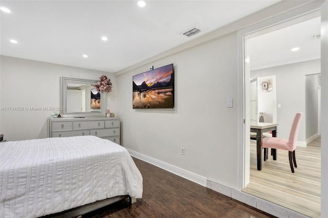 bedroom featuring wood-type flooring