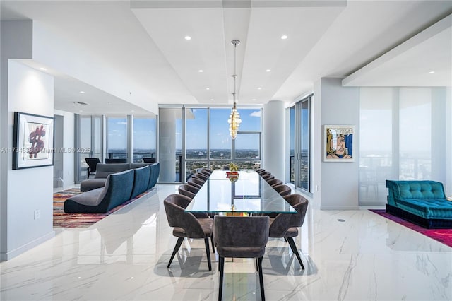 dining space featuring expansive windows