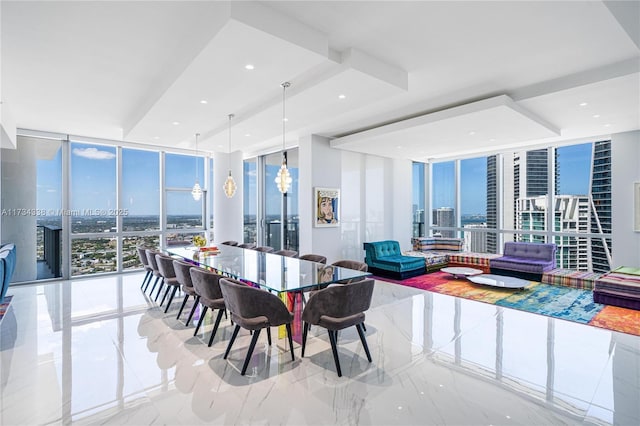 dining area featuring expansive windows