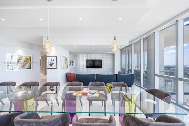 dining room featuring expansive windows