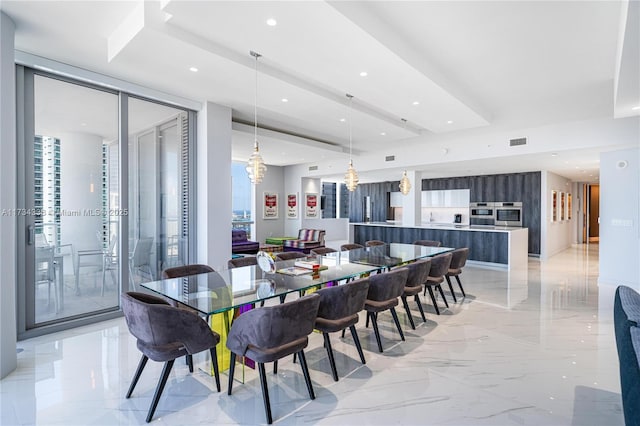 dining room featuring a wall of windows