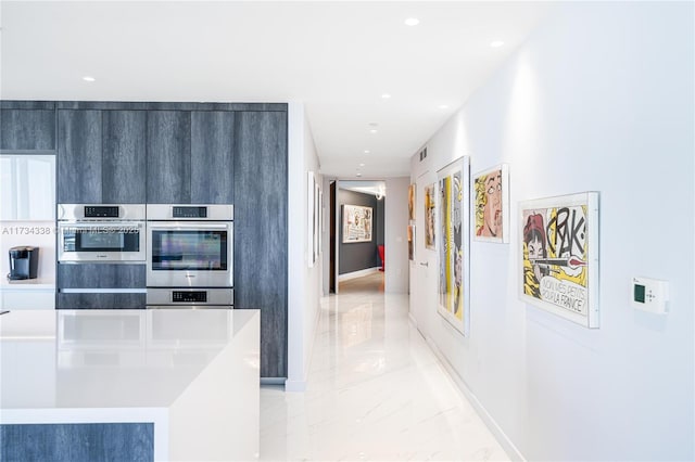 kitchen with stainless steel double oven