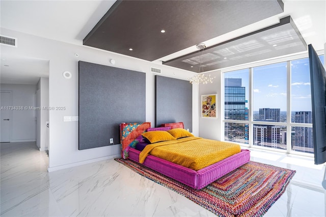 bedroom featuring expansive windows