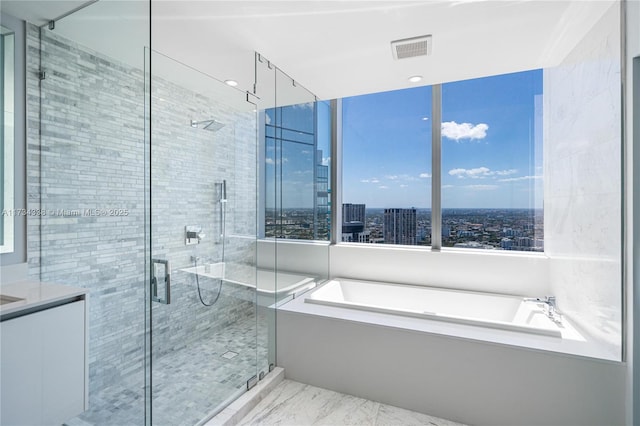 bathroom with independent shower and bath