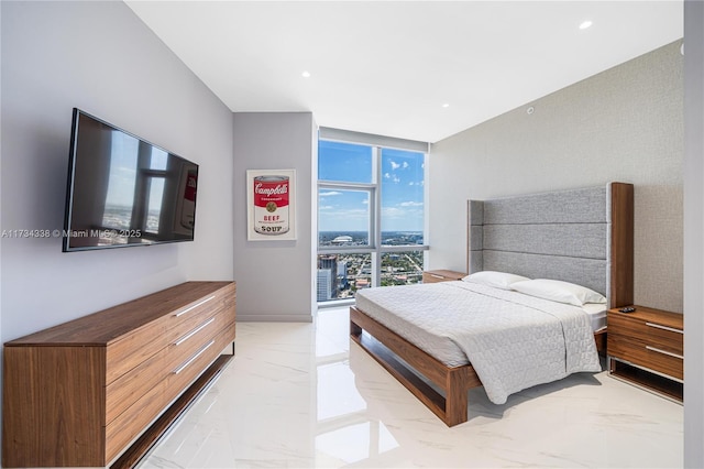 bedroom featuring expansive windows