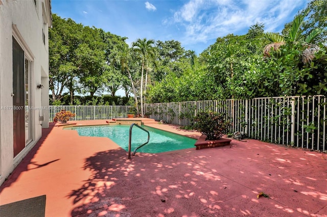 view of pool with a patio area