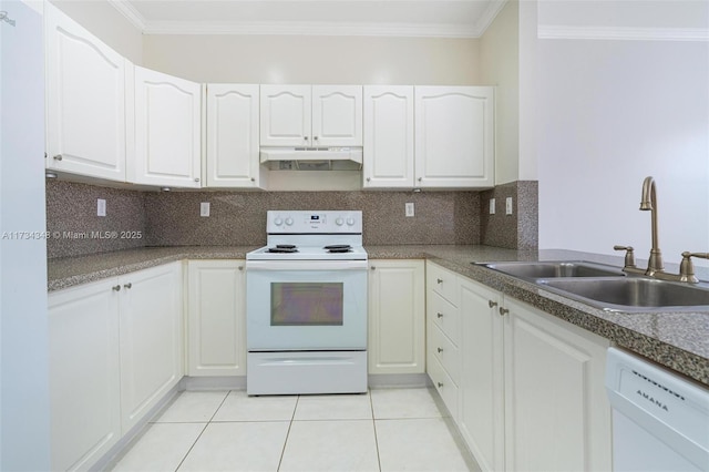 kitchen with sink, white cabinetry, tasteful backsplash, light tile patterned floors, and white appliances