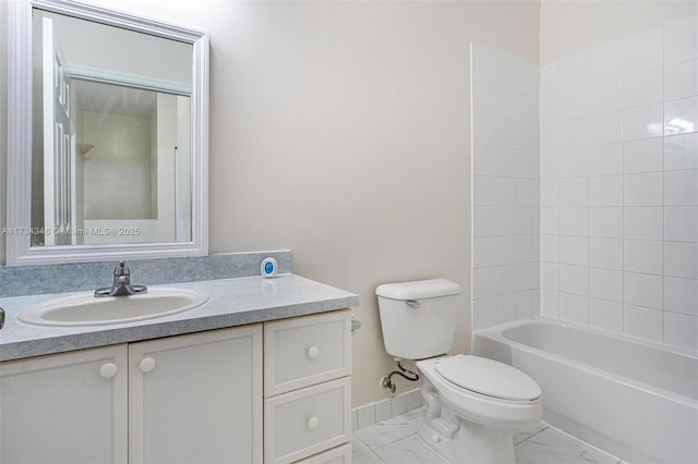 full bathroom featuring vanity, bathing tub / shower combination, and toilet