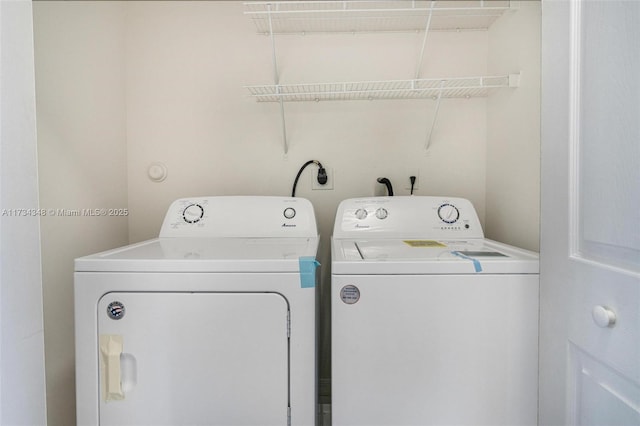 washroom featuring separate washer and dryer