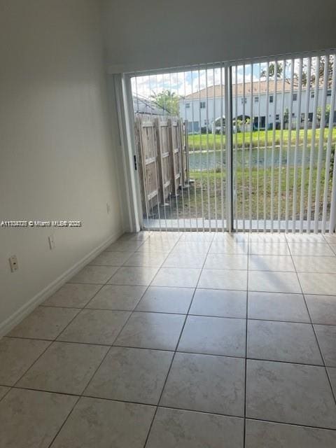 view of tiled spare room