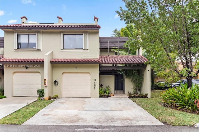 view of front of property featuring a garage