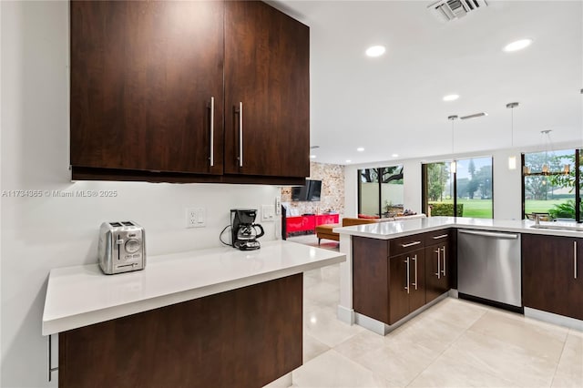 kitchen featuring dishwasher, backsplash, hanging light fixtures, dark brown cabinetry, and kitchen peninsula