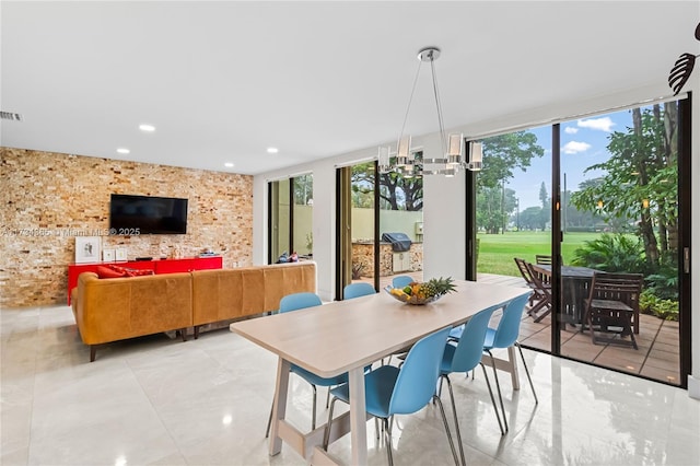 dining space with expansive windows and plenty of natural light