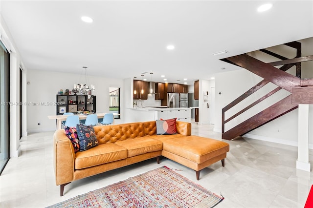 living room featuring a chandelier