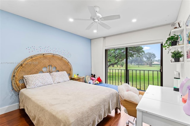 bedroom with dark hardwood / wood-style floors, access to outside, and ceiling fan