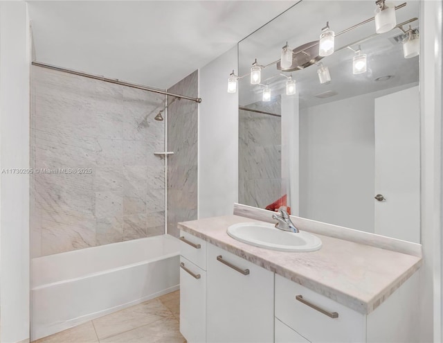 bathroom with vanity and tiled shower / bath combo