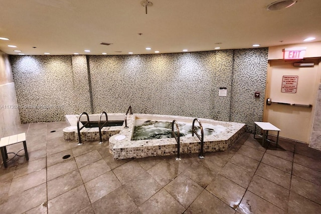 bathroom with tile patterned floors